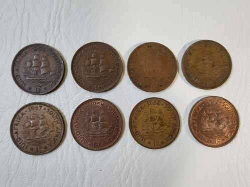 A 1953-1960 CRONOLOGICAL SET OF 8 SOUTH AFRICAN ONE PENNY COINS FIRST PORTRAIT OF QUEEN ELIZABETH II