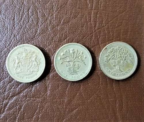 A RARE 1983 UNITED KINGDOM ONE POUND COIN PLUS AN 1984 SCOTTISH 1 POUND COIN AND A 1987 ENGLISH 1 PO
