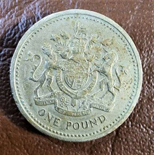 A RARE 1983 UNITED KINGDOM ONE POUND COIN PLUS AN 1984 SCOTTISH 1 POUND COIN AND A 1987 ENGLISH 1 PO