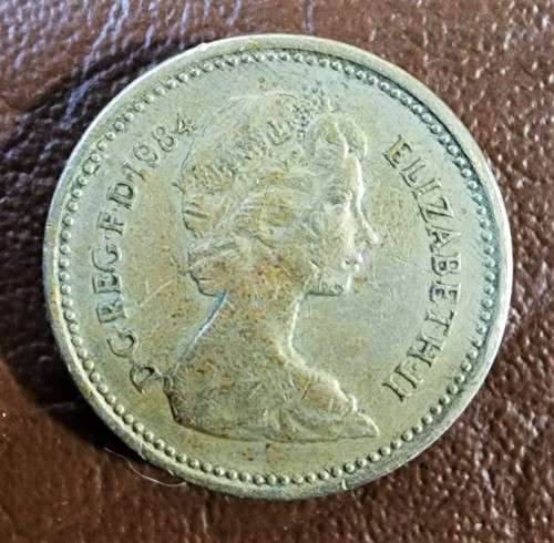 A RARE 1983 UNITED KINGDOM ONE POUND COIN PLUS AN 1984 SCOTTISH 1 POUND COIN AND A 1987 ENGLISH 1 PO