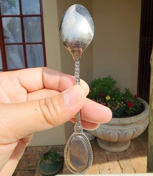 SET OF SIX FRENCH ROSE DECORATED ENAMELLED OVAL HANDLED STAINLESS STEEL TEA SPOONS