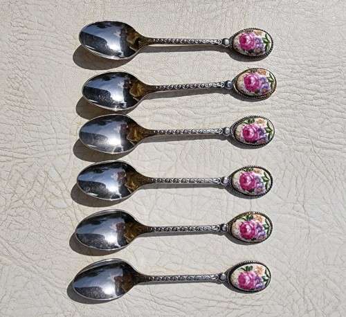 SET OF SIX FRENCH ROSE DECORATED ENAMELLED OVAL HANDLED STAINLESS STEEL TEA SPOONS