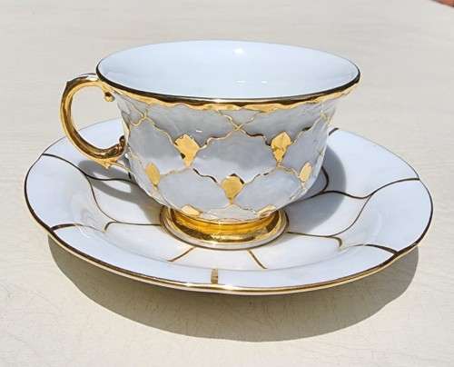 MEISSEN GERMANY PORCELAIN CUP AND SAUCER - GOLD DECORATED - BLUE CROSSED SWORD MARK (1935-1973)