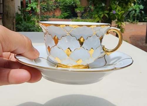 MEISSEN GERMANY PORCELAIN CUP AND SAUCER - GOLD DECORATED - BLUE CROSSED SWORD MARK (1935-1973)