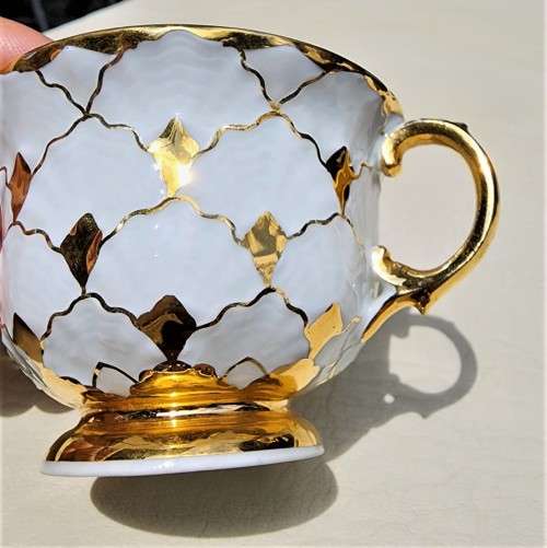 MEISSEN GERMANY PORCELAIN CUP AND SAUCER - GOLD DECORATED - BLUE CROSSED SWORD MARK (1935-1973)