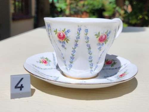 ROYAL ALBERT (1966-1970S) MINUET PATTERN SHELLEY SHAPED CUP AND SAUCER AND SIDEPLATE TRIO 4TH OF 6