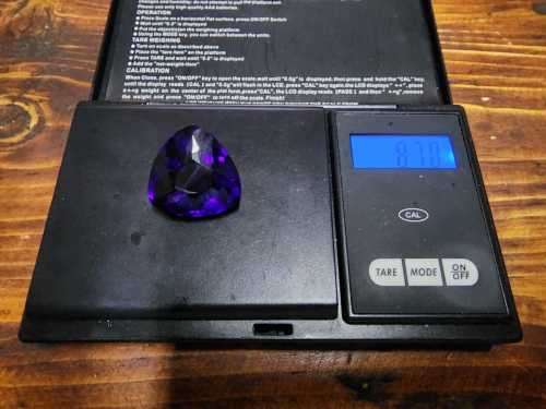 VIVID DARK PURPLE HUGE 43.54CT AMETHYST GEMSTONE WITH AN AMAZING TRILLION CUT (30 - 50 FACETS!)