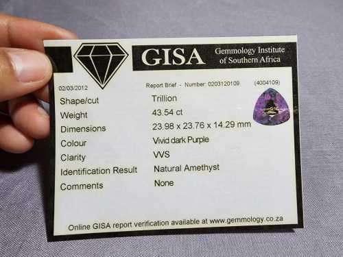 VIVID DARK PURPLE HUGE 43.54CT AMETHYST GEMSTONE WITH AN AMAZING TRILLION CUT (30 - 50 FACETS!)