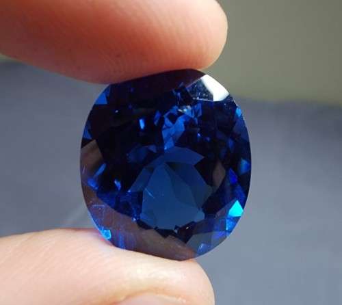 GORGEOUS LARGE 23,15CT LONDON BLUE TOPAZ GEMSTONE WITH BEAUTIFUL OVAL CUT  NATURAL GEMSTONE HEATED