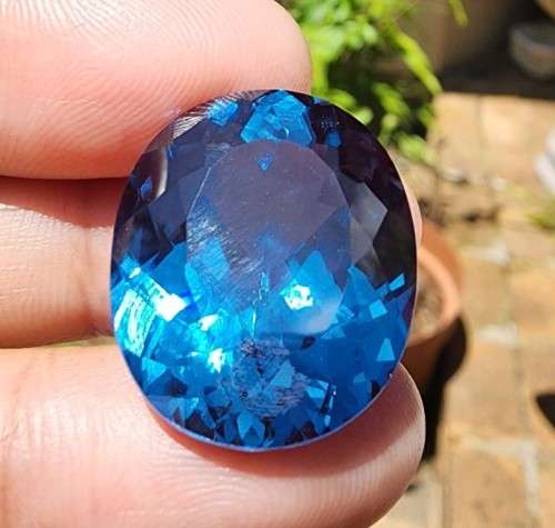 VERY LARGE 34.60CT LONDON BLUE TOPAZ GEMSTONE WITH BEAUTIFUL OVAL CUT - IRRADIATED FOR 4 YEARS!