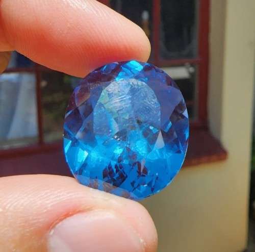 VERY LARGE 34.60CT LONDON BLUE TOPAZ GEMSTONE WITH BEAUTIFUL OVAL CUT - IRRADIATED FOR 4 YEARS!