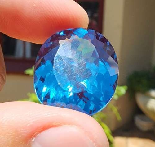 VERY LARGE 34.60CT LONDON BLUE TOPAZ GEMSTONE WITH BEAUTIFUL OVAL CUT - IRRADIATED FOR 4 YEARS!