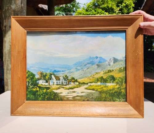 TINUS DE JONGH (1885-1942) CAPE DUTCH FARMSTEAD AND MOUNTAINS VINTAGE WOODEN FRAMED PRINT