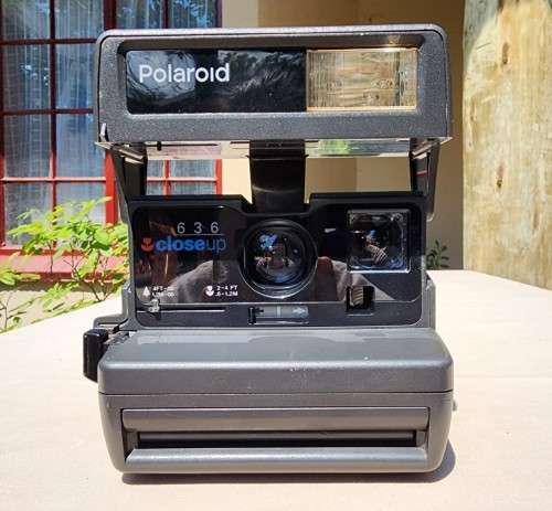 POLAROID 636 CLOSE-UP INSTANT CAMERA BOXED WITH OLD FILM CARTRIDGE AND TWO EXPOSED FILM SLIDES