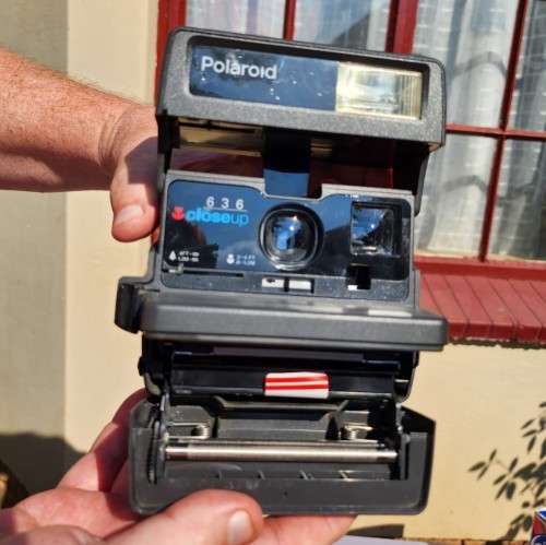 POLAROID 636 CLOSE-UP INSTANT CAMERA BOXED WITH OLD FILM CARTRIDGE AND TWO EXPOSED FILM SLIDES