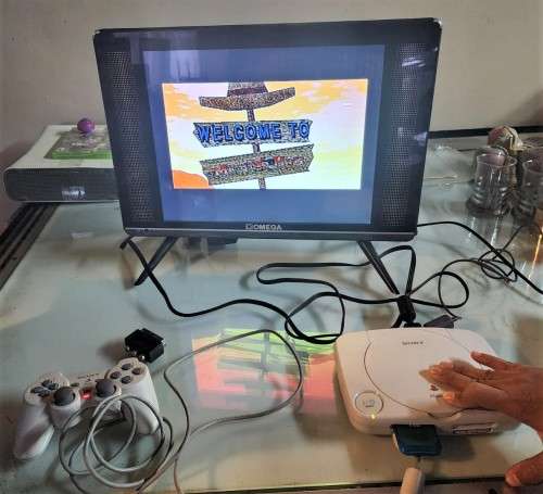 A MIGHTY PS ONE BUNDLE WORKING: CONSOLE WITH DUAL SHOCK CONTROLLER, MEMORY CARD AND TWO GAMES