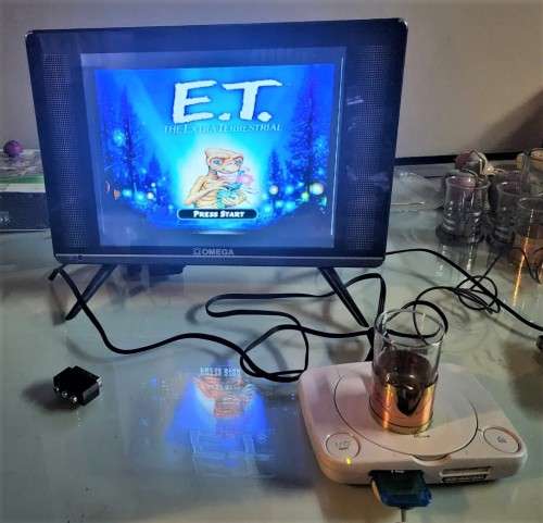 A MIGHTY PS ONE BUNDLE WORKING: CONSOLE WITH DUAL SHOCK CONTROLLER, MEMORY CARD AND TWO GAMES