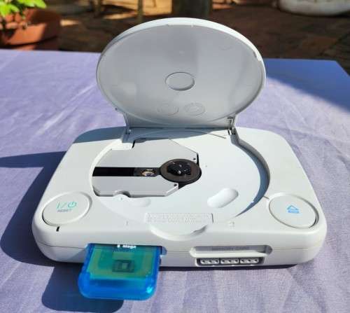 A MIGHTY PS ONE BUNDLE WORKING: CONSOLE WITH DUAL SHOCK CONTROLLER, MEMORY CARD AND TWO GAMES