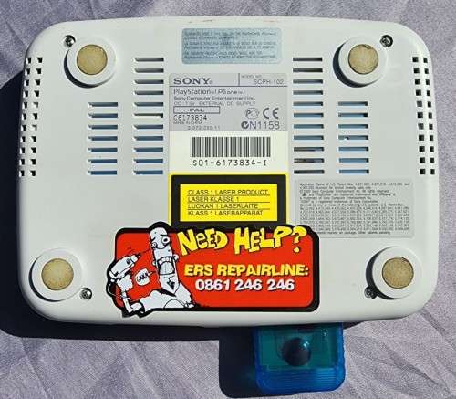A MIGHTY PS ONE BUNDLE WORKING: CONSOLE WITH DUAL SHOCK CONTROLLER, MEMORY CARD AND TWO GAMES