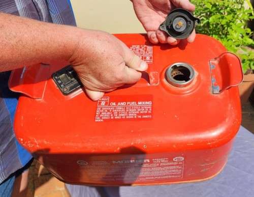 METAL MARINER 24 LITER OUTBOARD FUEL TANK WITH SOME FUEL STILL INSIDE