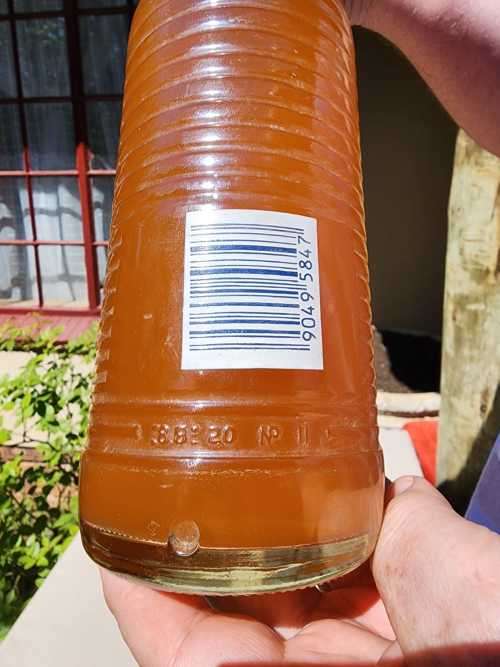 VINTAGE 1970S-1980S RIBBED FANTA 1L GLASS BOTTLE STILL FULL AND UNOPENED LABELS IN ENG AND AFR