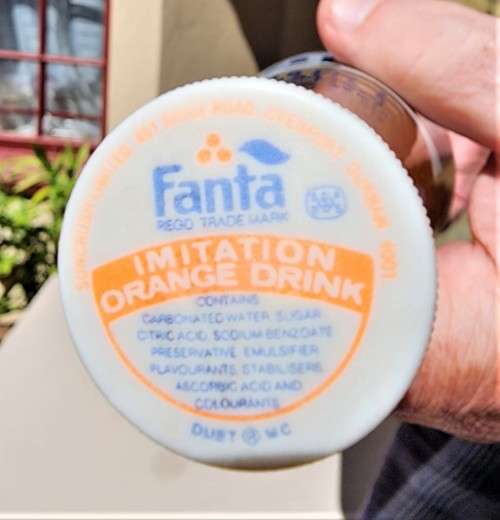VINTAGE 1970S-1980S RIBBED FANTA 1L GLASS BOTTLE STILL FULL AND UNOPENED LABELS IN ENG AND AFR