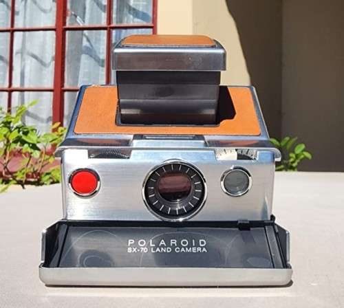COOL RETRO SLIM FOLDABLE POLAROID SX-70 INSTANT FILM BROWN MODEL 1 CAMERA FROM 1973