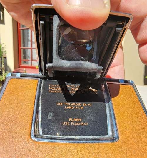 COOL RETRO SLIM FOLDABLE POLAROID SX-70 INSTANT FILM BROWN MODEL 1 CAMERA FROM 1973