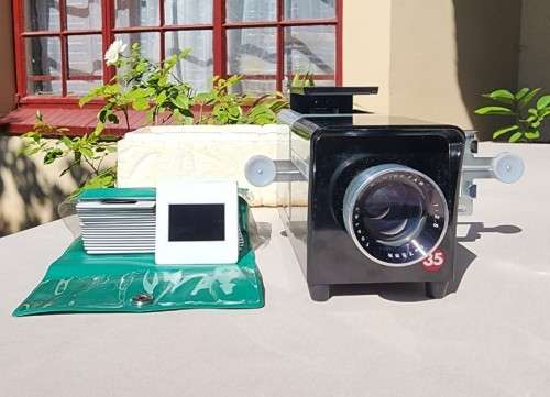 VINTAGE 1970S MINETTE EVA-VISION 35MM SLIDE PROJECTOR AND TIME MACHINE