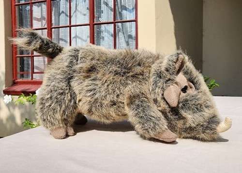 BORN IN SOUTH AFRICA A WARTHOG PLUSH TOY WITH WARTS AND ALL