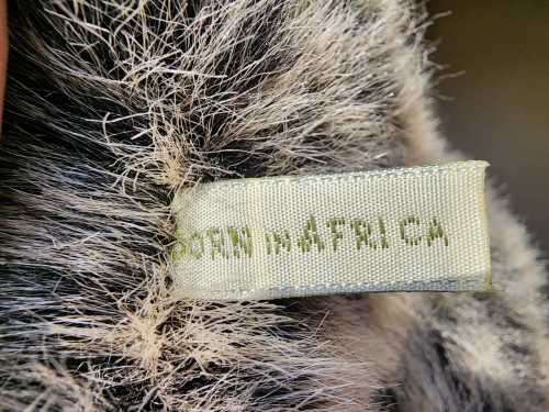BORN IN SOUTH AFRICA A WARTHOG PLUSH TOY WITH WARTS AND ALL