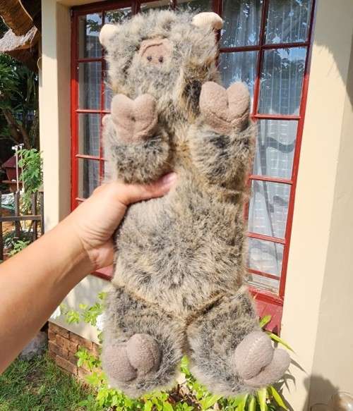 BORN IN SOUTH AFRICA A WARTHOG PLUSH TOY WITH WARTS AND ALL