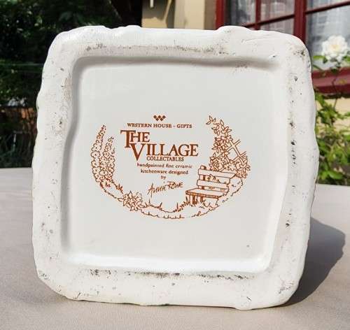 THE VILLAGE COLLECTABLE HAND PAINTED CERAMIC TEA CANNISTER DESIGNED BY ANNIE ROWE