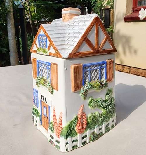 THE VILLAGE COLLECTABLE HAND PAINTED CERAMIC TEA CANNISTER DESIGNED BY ANNIE ROWE