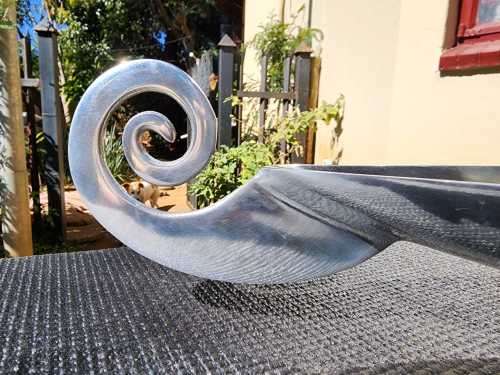 STRIKING ALUMINIUM FRUIT BOWL WITH CAROL BOYES STYLE SPIRAL ENDS
