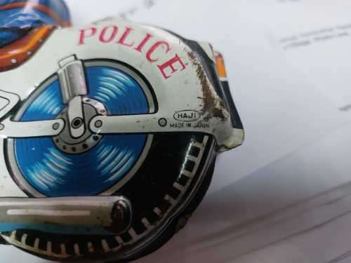 RARE VINTAGE 1950S HAJI JAPANESE MANUFACTURED TIN POLICEMAN NO 7 MOTORCYCLE