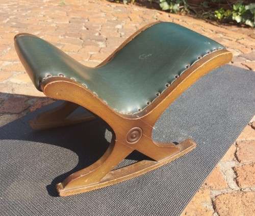 ANTIQUE X BASE ROCKING FOOT GOUT STOOL WITH GREEN TANNED LEATHER UPHOLSTERY