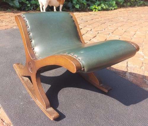 ANTIQUE X BASE ROCKING FOOT GOUT STOOL WITH GREEN TANNED LEATHER UPHOLSTERY