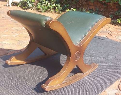 ANTIQUE X BASE ROCKING FOOT GOUT STOOL WITH GREEN TANNED LEATHER UPHOLSTERY