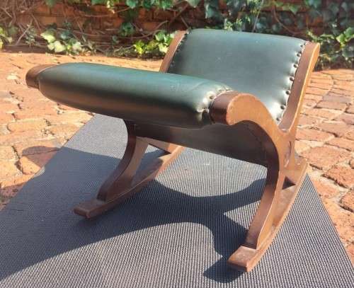 ANTIQUE X BASE ROCKING FOOT GOUT STOOL WITH GREEN TANNED LEATHER UPHOLSTERY