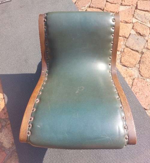 ANTIQUE X BASE ROCKING FOOT GOUT STOOL WITH GREEN TANNED LEATHER UPHOLSTERY