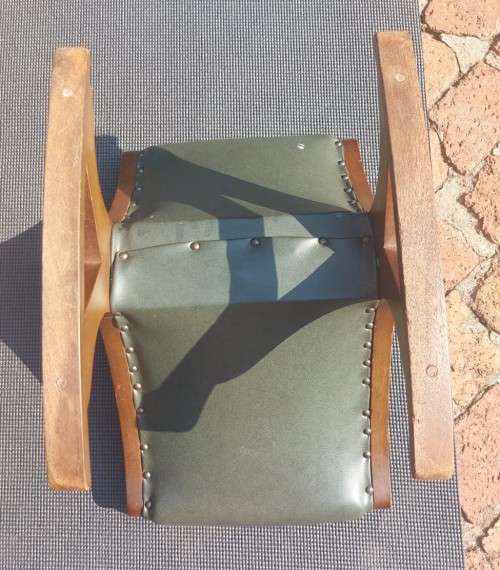 ANTIQUE X BASE ROCKING FOOT GOUT STOOL WITH GREEN TANNED LEATHER UPHOLSTERY