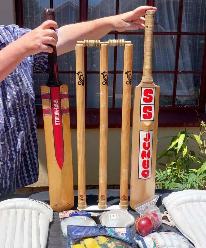 VINTAGE 1980S CRICKET SET WITH 2 FAMOUS CRICKET BATS: AN STUART SURRIDGE SS JUMBO AND A GRAY NICHOLS