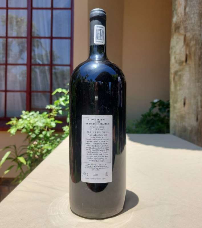 A 2002 CLOS MALVERNE 1,5L DEBENTURE RESERVE IN WOODEN CRATE  A UNIQUE BLEND OF PINOTAGE AND MERLOT