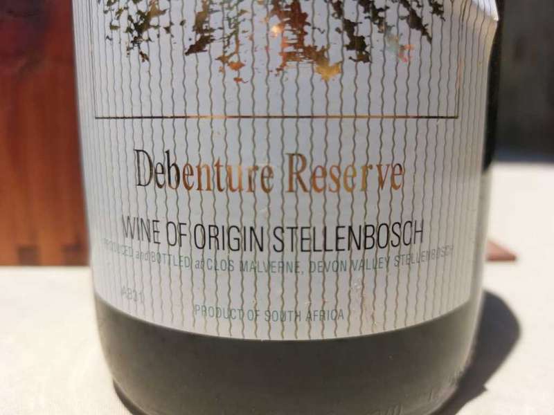 A 2002 CLOS MALVERNE 1,5L DEBENTURE RESERVE IN WOODEN CRATE  A UNIQUE BLEND OF PINOTAGE AND MERLOT
