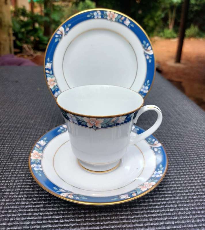 TWO HAND DECORATED NORITAKE SRI LANKA TRIOS (TEACUP, SAUCER, SIDEPLATE) CIRCA 1988-1996.