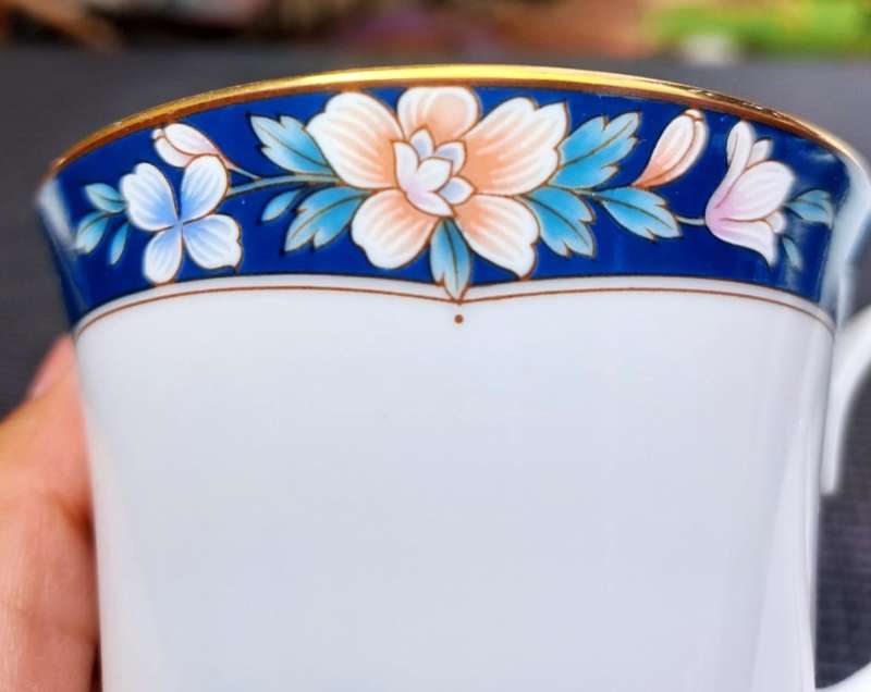 TWO HAND DECORATED NORITAKE SRI LANKA TRIOS (TEACUP, SAUCER, SIDEPLATE) CIRCA 1988-1996.