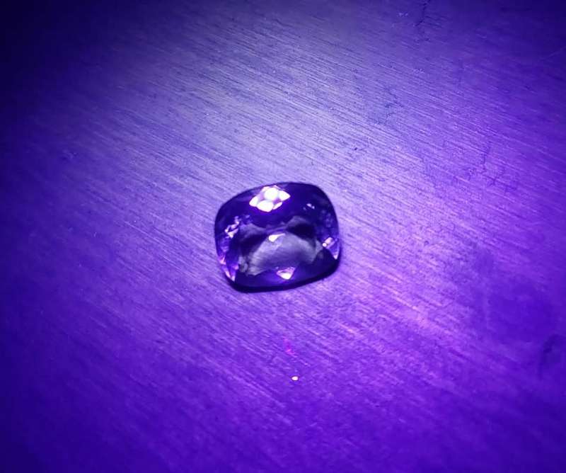 HOW STRANGE? A LARGE 17,30CT GREEN AMETHYST GEMSTONE WITH BEAUTIFUL CUSHION CUT