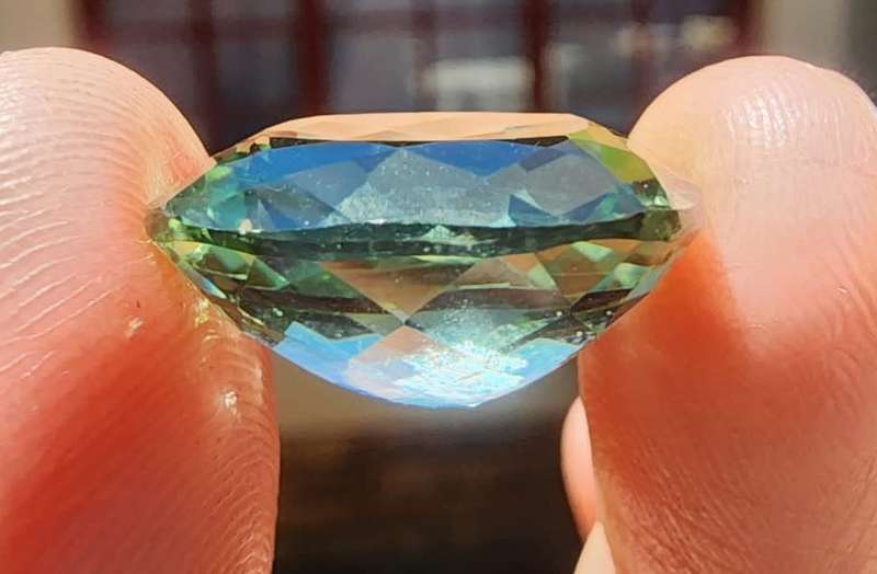 HOW STRANGE? A LARGE 17,30CT GREEN AMETHYST GEMSTONE WITH BEAUTIFUL CUSHION CUT