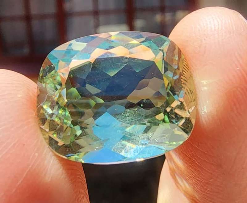 HOW STRANGE? A LARGE 17,30CT GREEN AMETHYST GEMSTONE WITH BEAUTIFUL CUSHION CUT